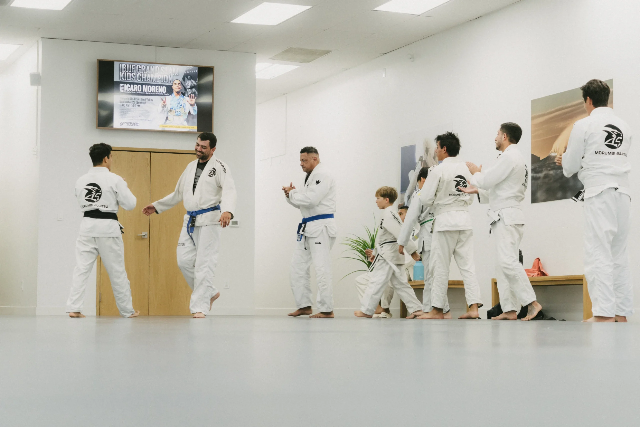 Adults practicing Brazilian Jiu Jitsu at Morumbi Academy